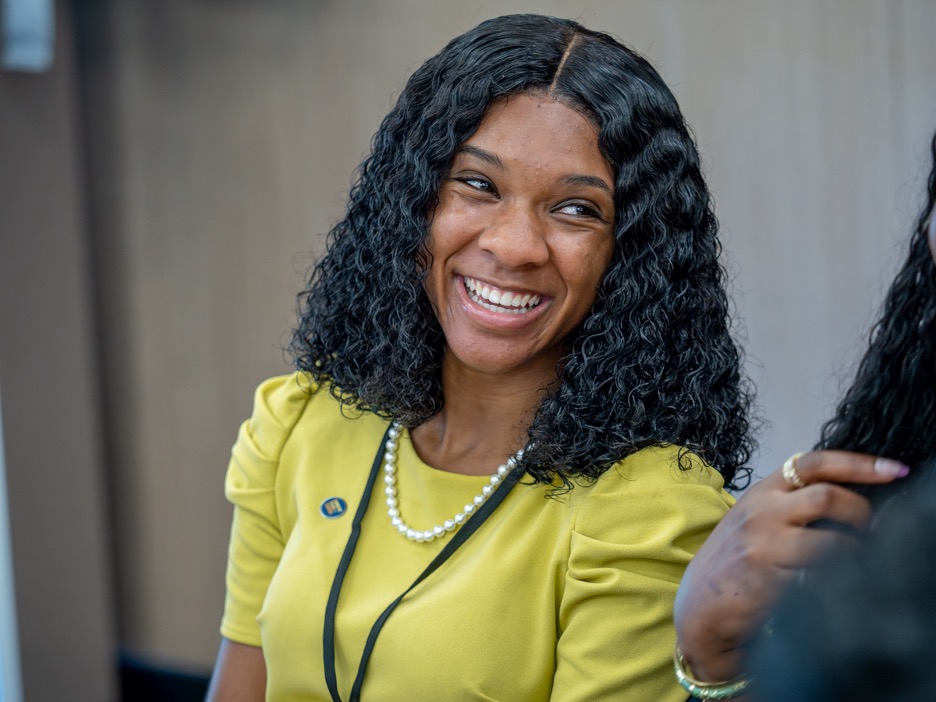 woman smiling at an event